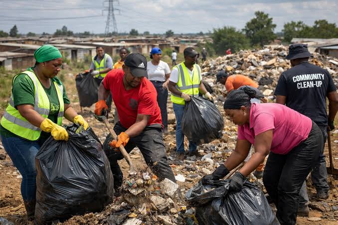 South African community members working together on a local development initiative