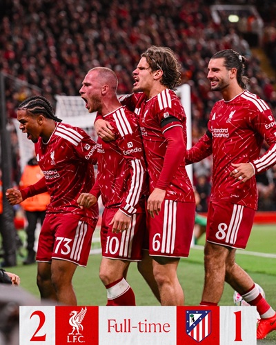 Liverpool players celebrate 2-1 Champions League win over Atletico Madrid at Anfield